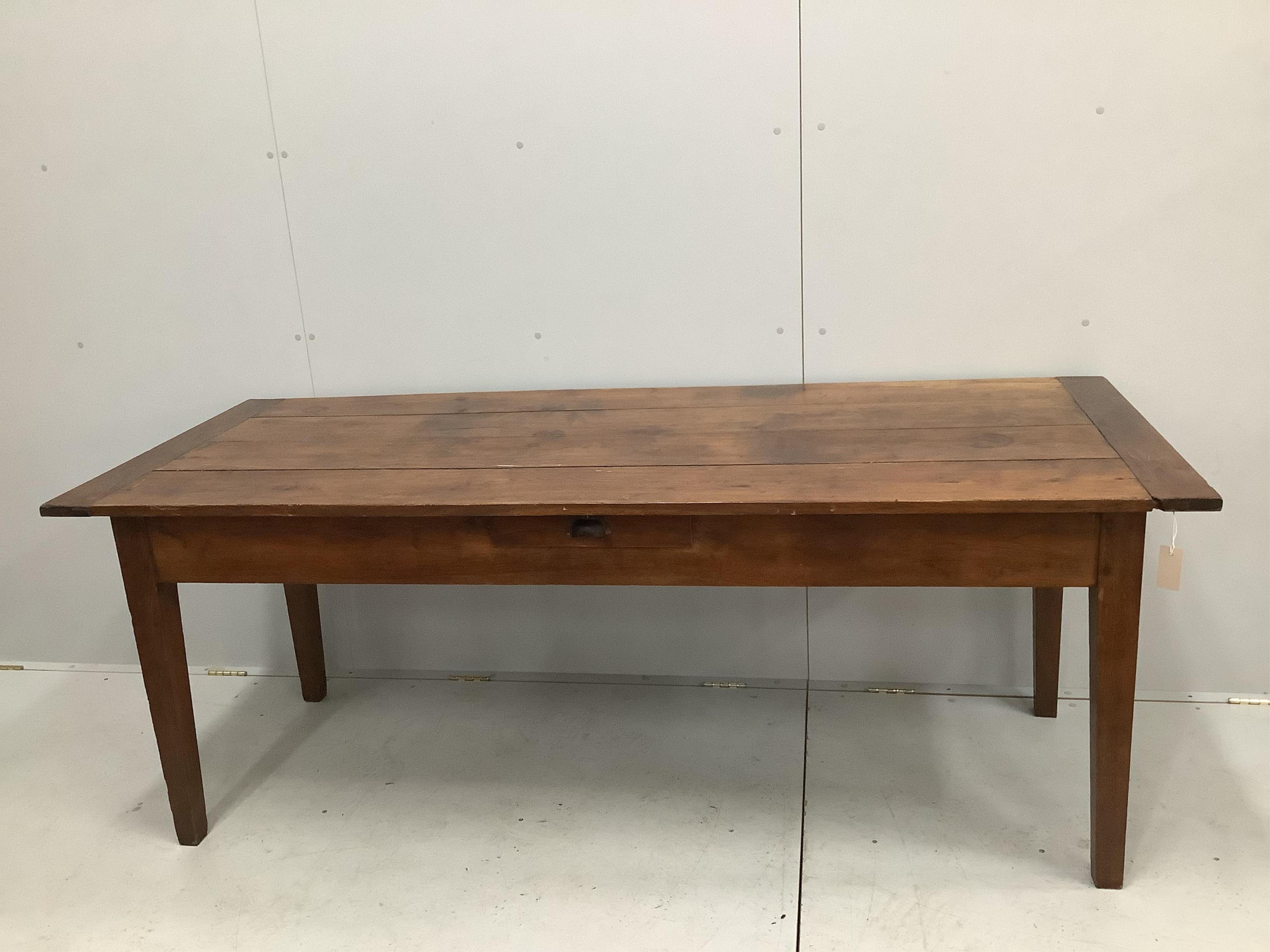 A 19th century French rectangular oak kitchen table, width 201cm, depth 80cm, height 78cm. Condition - fair